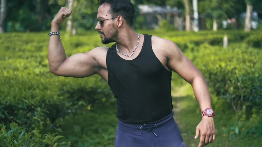 Athletic person jogging outdoors with visible perspiration, demonstrating moisture exposure during exercise