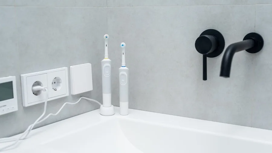 bathroom sink with electric toothbrush and accessories