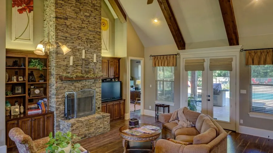 Bright living room with hardwood floors and minimalist furniture, showing clean home interior