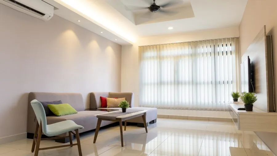 Bright modern apartment living room with open floor plan and hardwood flooring