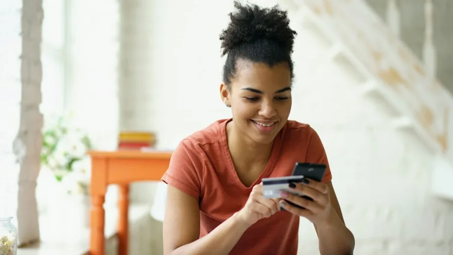 budget conscious shopper checking phone prices online