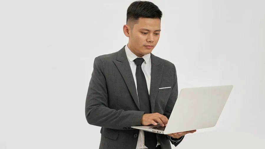 businessman typing laptop financial decision