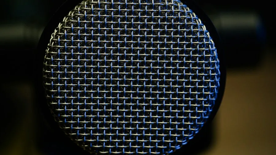 close up cleaning headphone microphone grille