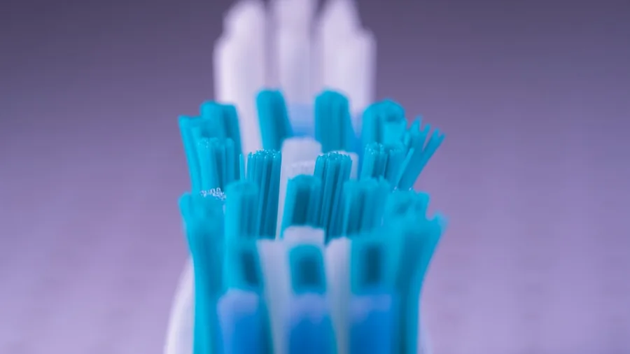 close up electric toothbrush bristles macro shot