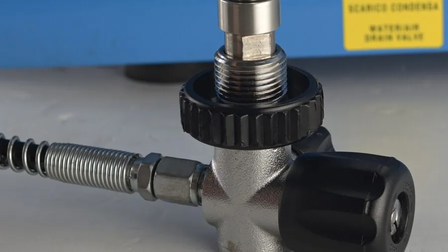Close-up of a laptop hinge mechanism showing mechanical components and durability in everyday use