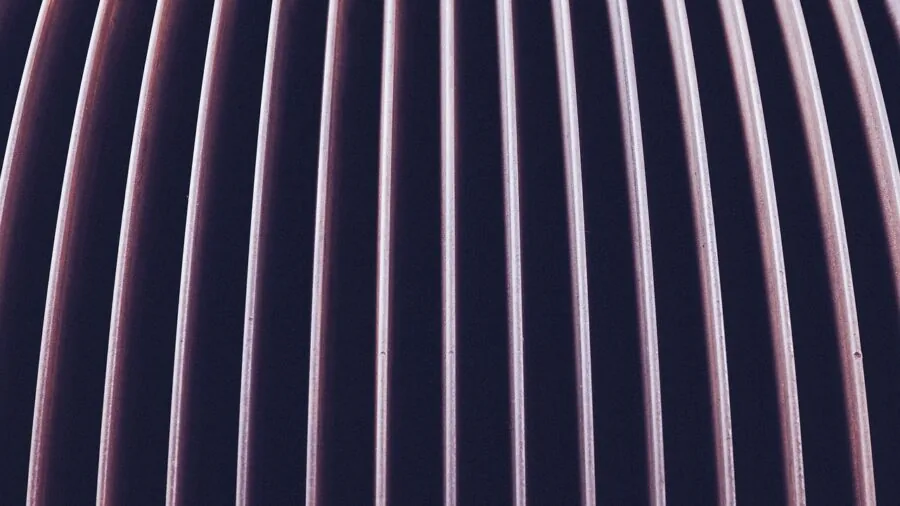 Close-up of computer case internal airflow with cooling fans and ventilation channels visible