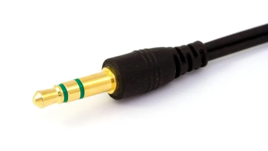 Close-up of various outdoor camping equipment cables and power connectors organized for a camping trip