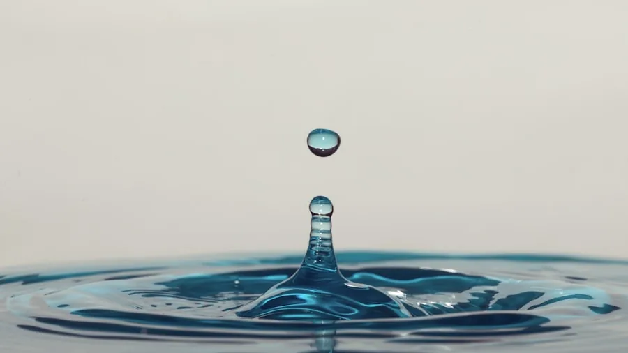 Close-up of water droplets on a protected surface demonstrating water resistance testing