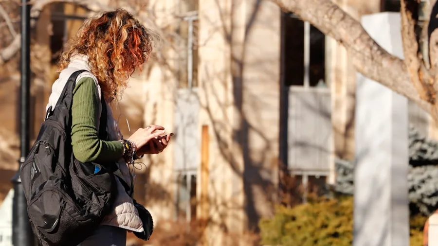 college student with tablet and smartphone campus