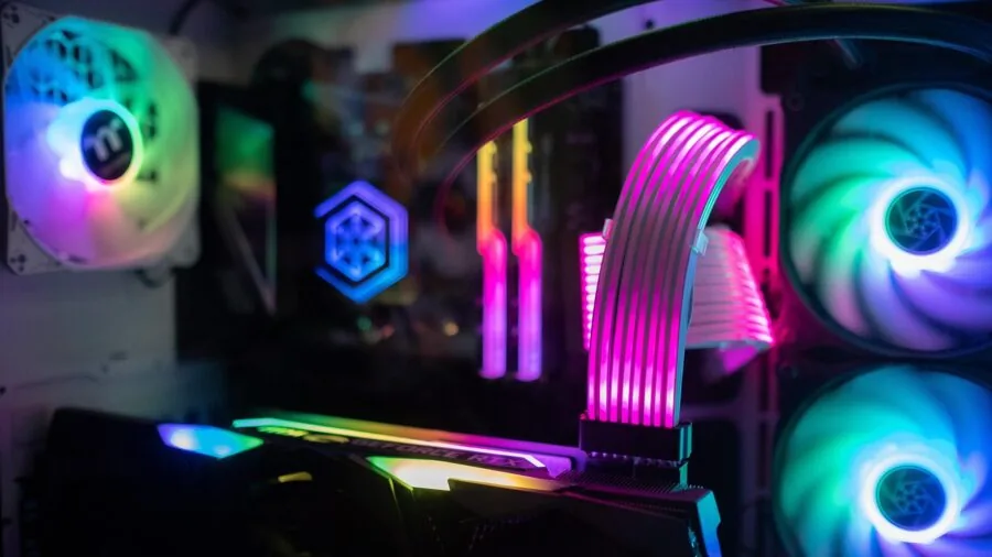 Competitive gamer focused on monitor during intense esports match with gaming setup