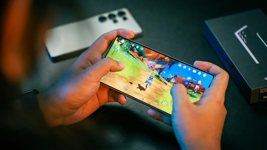 competitive gamer playing mobile game