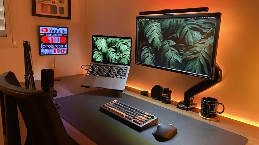 creative desk setup with multiple displays