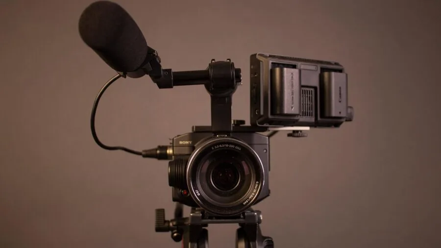 Creator filming vertical video content on smartphone for social media