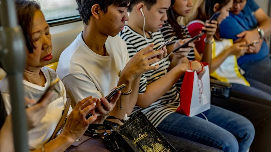 customers checking smartphones online