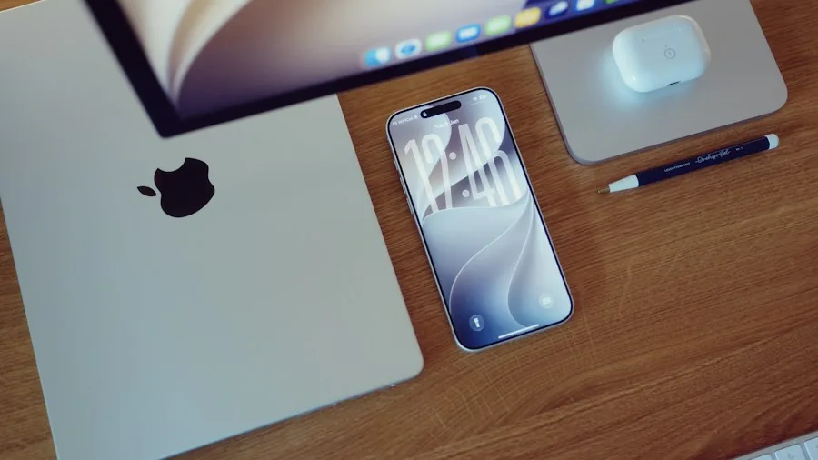 desk workspace with multiple Apple devices