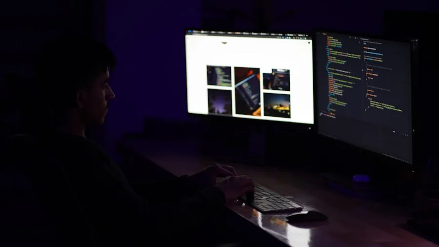 Developer coding at computer workstation with large display in focused workspace