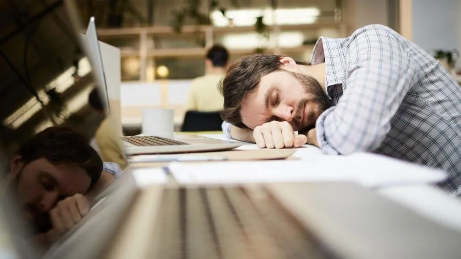 Exhausted home office worker taking a break from computer screen work