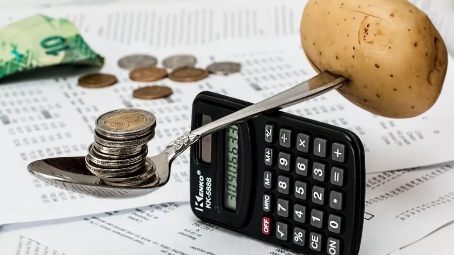 Family discussing finances and budget planning together at home table