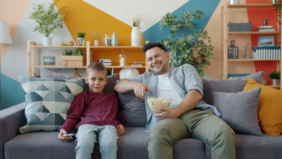 Family enjoying a movie together in a home theater room with projected screen