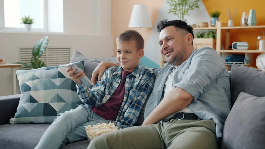 Family gathered on couch enjoying streaming content on television in modern living room