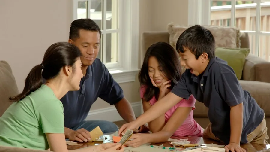 family playing cooperative video game