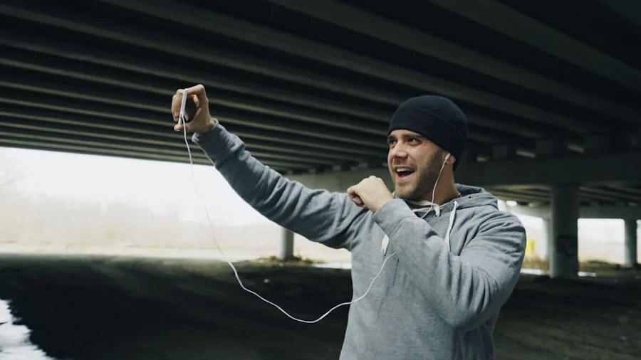 Female runner jogging outdoors in windy conditions, testing audio equipment during workout