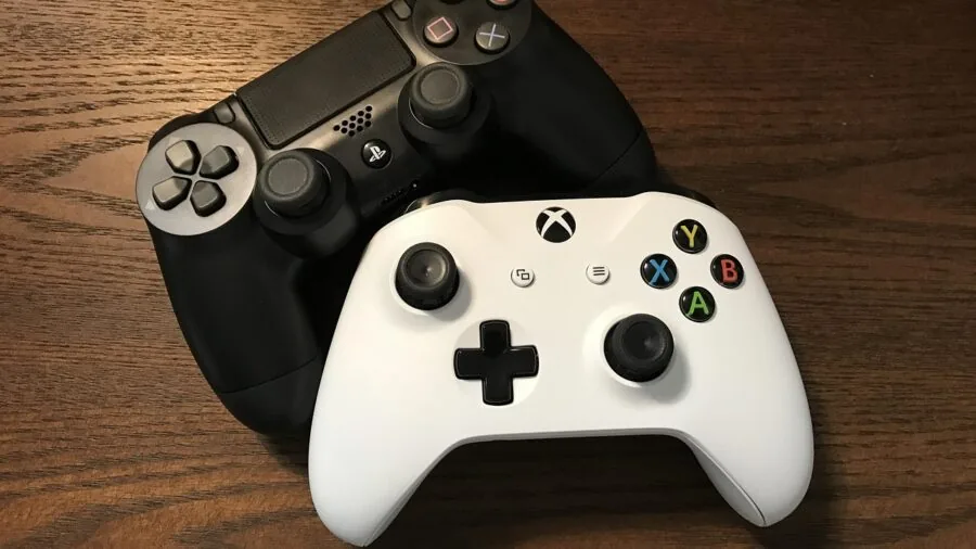 Gamer holding wireless controller during intense gaming session