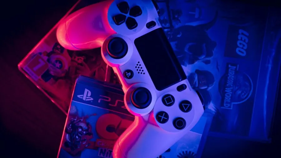 gamer holding wireless controller