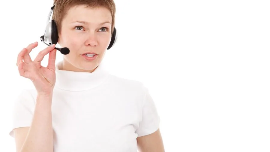 Gamer wearing headset with boom microphone during competitive gaming session