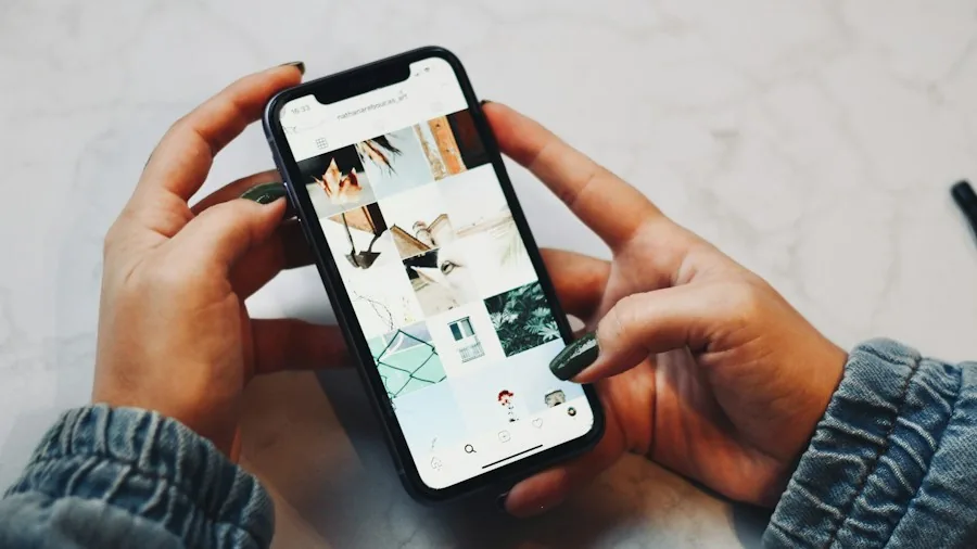 hands holding phone checking privacy settings menu