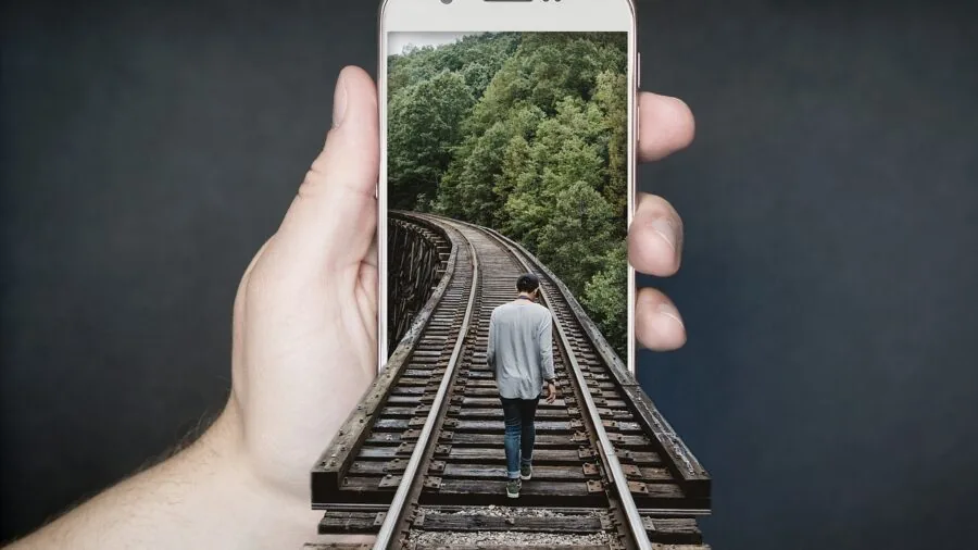 hands holding premium smartphone outdoors