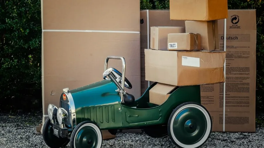 Homeowner listening attentively as doorbell rings during package delivery at front door