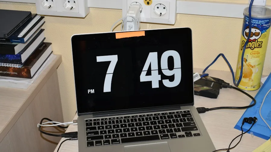laptop on desk with power cable