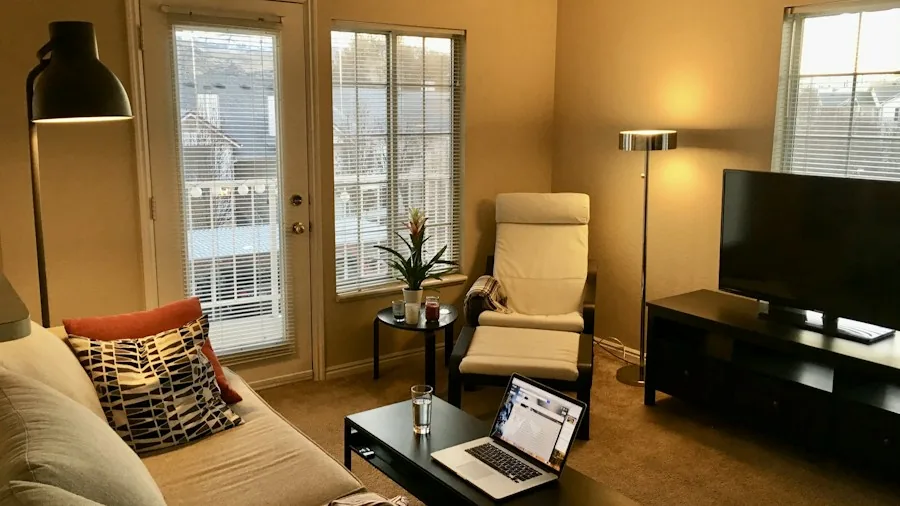 living room TV setup with router nearby
