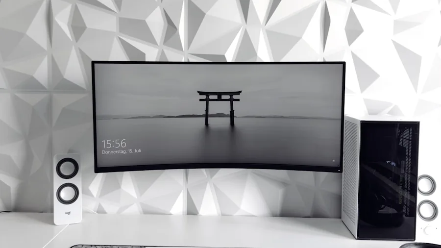 Minimalist desk workspace with compact monitor and everyday work essentials in natural lighting