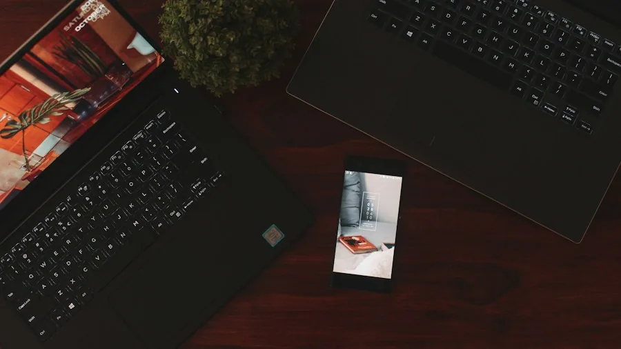 modern Android smartphone laptop desk