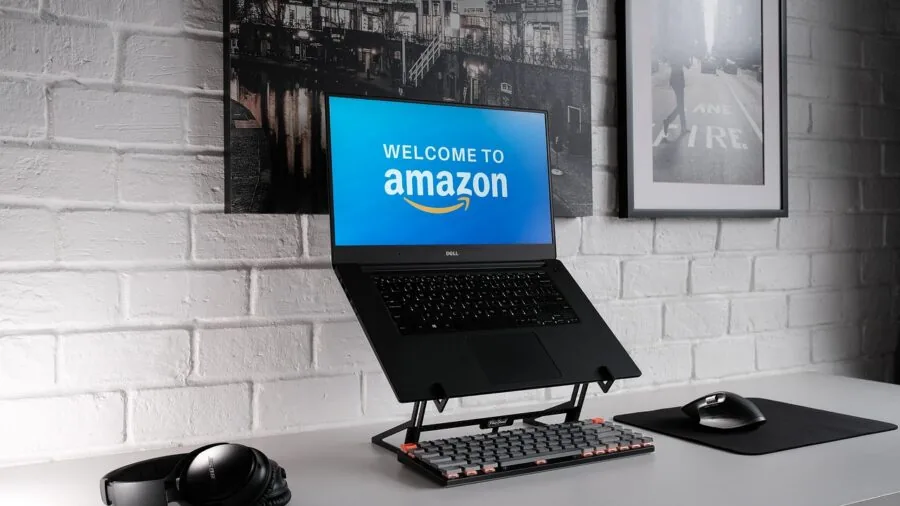 Modern home office desk with multiple monitors and organized workspace for productive remote work
