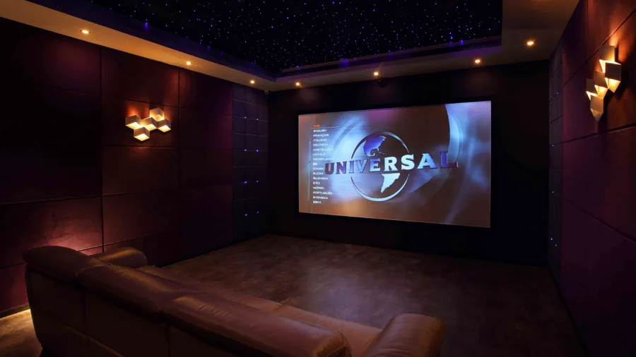 Modern living room with comfortable seating and ambient lighting for movie watching experience