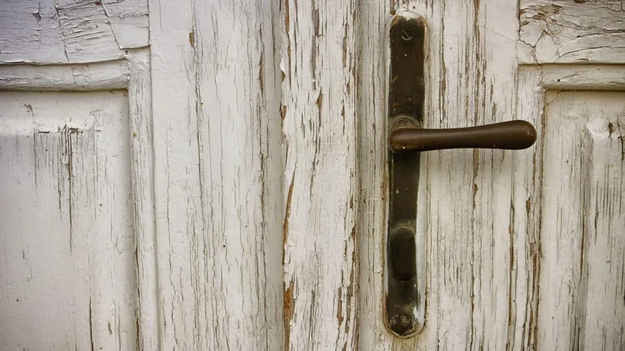 Multiple people arriving at a residential front door, representing different household members and guests accessing a shared home