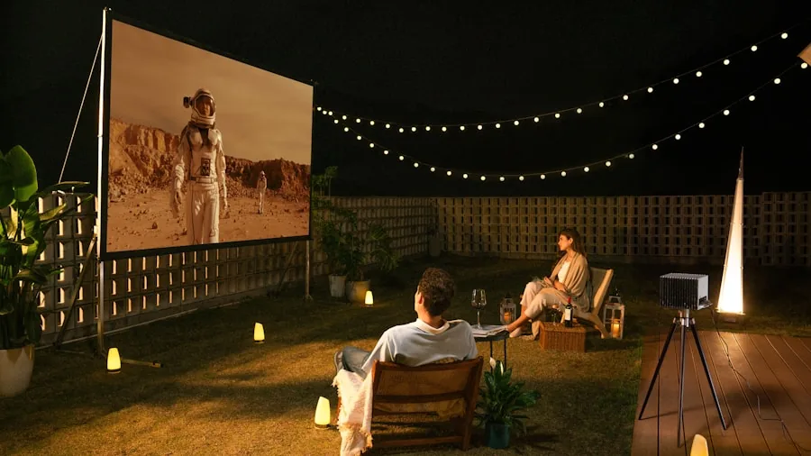 People enjoying outdoor movie screening with external speakers in backyard setting at dusk