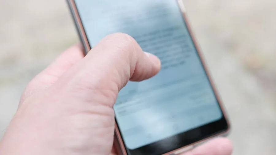 People from different backgrounds using smartphones in everyday situations like work, school, and commuting