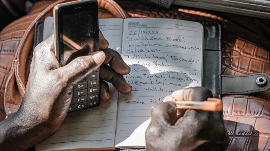person budgeting expenses phone purchase