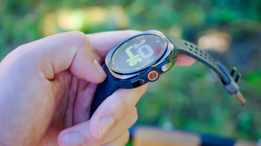 person checking fitness metrics on wearable