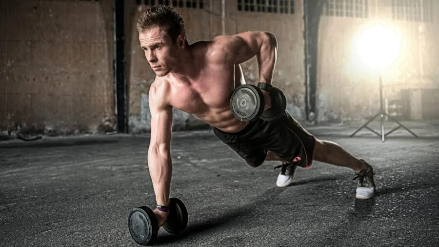 Person checking heart rate on wrist during intense cardio exercise session