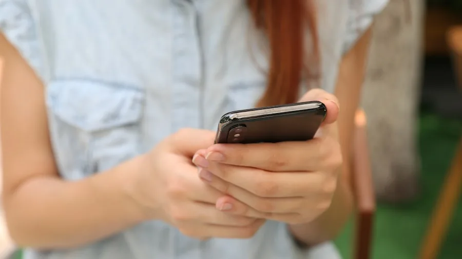 person checking phone IMEI number