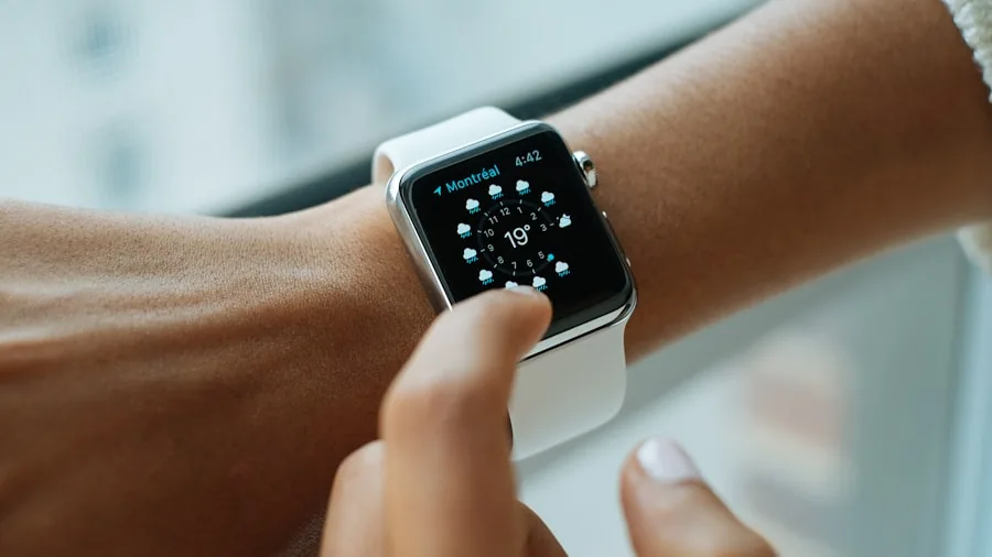 person checking smartwatch notifications