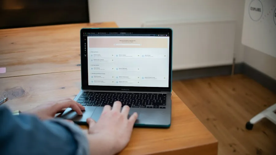 person checking WiFi settings on computer