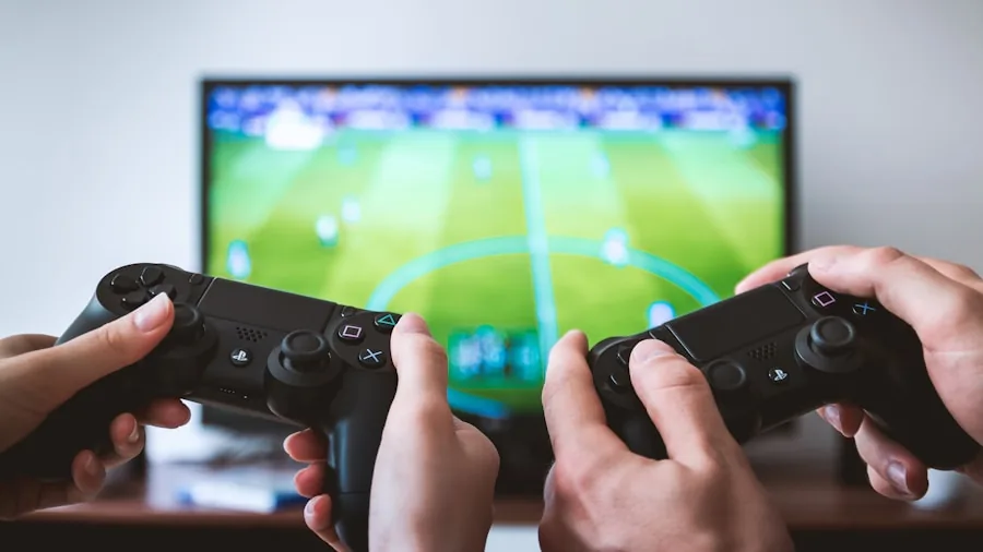 Person enjoying gaming on console with controller in living room setting