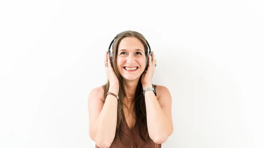 Person enjoying high-fidelity wireless audio in a natural setting, demonstrating real-world earbuds usage