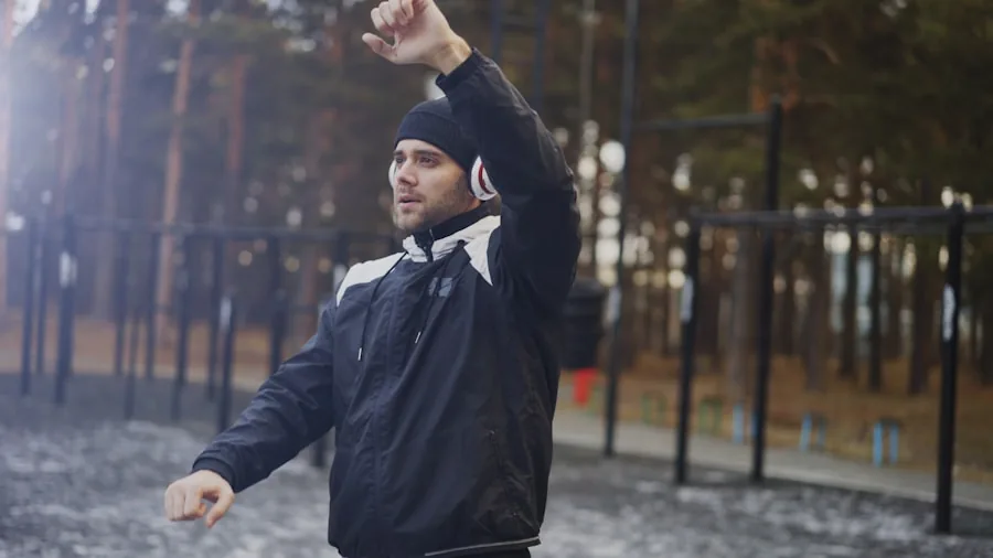Person enjoying music while walking outside in natural daylight, casual lifestyle scene